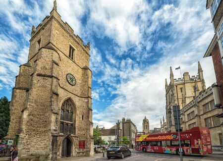 CAMBRIDGE, UNITED KINGDOM - JULY 11, 2016: Red open topped Cambridge tour bus along Trumpington Street, Cambridge, England, UK, Western Europe, July 11, 2016.のeditorial素材