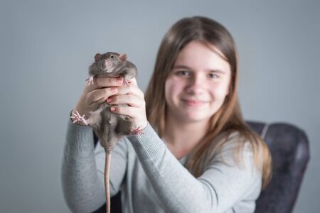 Girl with rat friendの写真素材