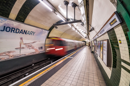 LONDON, UK - 12 JULY, 2016: London Underground station interior on July 12, 2016 in London, UK. The system serves 270 stations, 402 kilometers of track with operation history of 150 years.のeditorial素材
