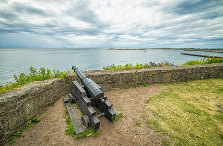 Fort cannon aimed on seaの写真素材