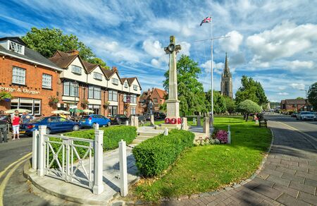 MARLOW - UK - JULY 10, 2016: Summer urban landscape of city square with War Memorial with All Saints Church in distance, in July 10, 2016 in Marlow, United Kingdom. Marlow has over 14000 citizens.のeditorial素材