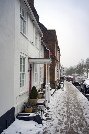 Snowy winter street scene at Odiham in Hampshire, UKの写真素材