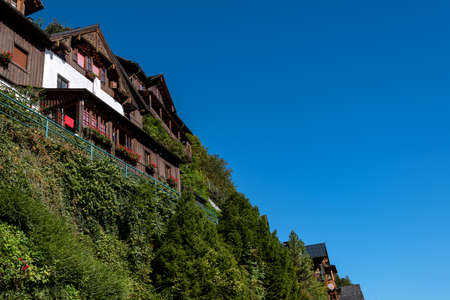 Wooden houses in City Hallstatt on a sunny dayの写真素材