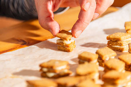 Piling Christmas Cookies Filled With Delicious Marzipan Creamの写真素材