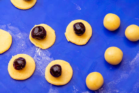 Handmade Marzipan Balls Filled With Amarena Cherryの写真素材