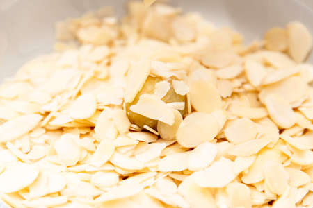 Almond Slivers Covering Marzipan Ball Filled With Amarena Cherryの写真素材