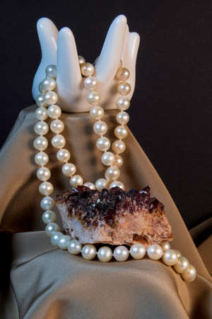 Amethyst And Pearl Necklace Presented On A Nice Draperyの写真素材