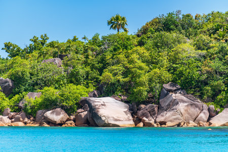 Beautiful Granite Boulders And Tropical Rainforest At The Anse Lazio On Praslin Island, Seychellesの写真素材