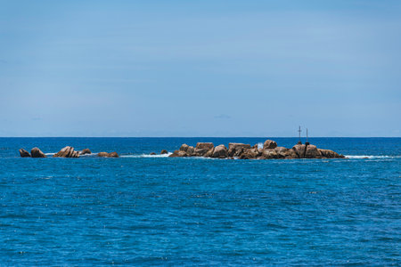 Beacon On A Rocky Islet To Warn Ships Of The Shallows Between Praslin And La Digue, Seychellesの写真素材