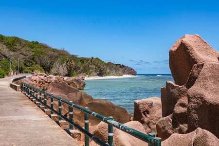 Beautiful Bicycle Lane Along The East Coast At Anse Banane On La Digue Island, Seychellesの写真素材