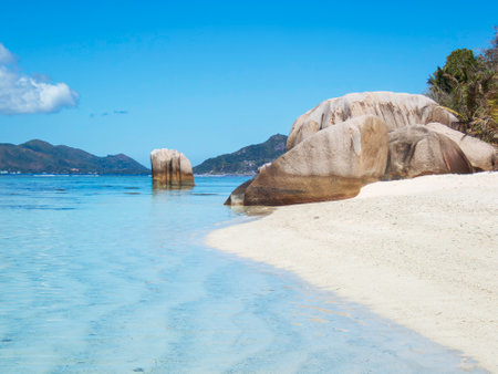 Dreamlike Beach With An Amazing View To Praslin - Seen At Anse Source d'Argent On La Digue Island, Seychellesの写真素材