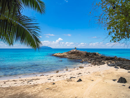Beautiful Cove With A Rocky Peninsula With A View To Silhouette Island - Seen On Mahe Island, Seychellesの写真素材