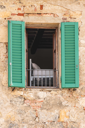 The Bed Behind The Window In An Old Tuscan House