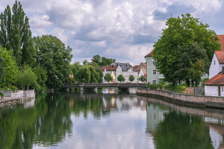 Bridge Over River Isar In The Historic City Center Of Landshut, Bavariaの写真素材