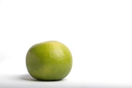 sweetie grapefruit isolated on a white backgroundの写真素材