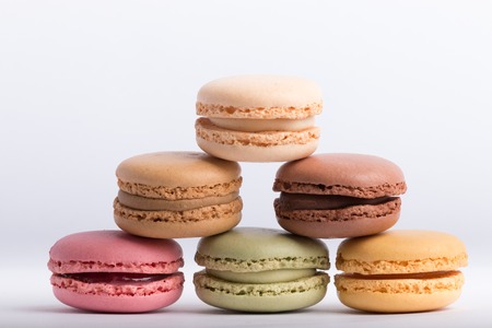 different tasteful macaroons on a white backgroundの写真素材