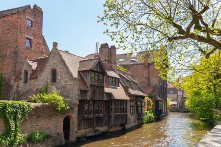 Bruges, Belgium - Mai 5, 2018: view of the medieval houses along the waterwaysのeditorial素材