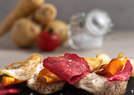 Root Vegetable chips made of sweet potato,beetroot,parsnip,manioc and taro with sea salt.の写真素材