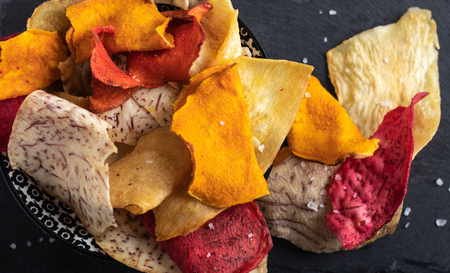 Root Vegetable chips made of sweet potato,beetroot,parsnip,manioc and taro with sea salt.の写真素材