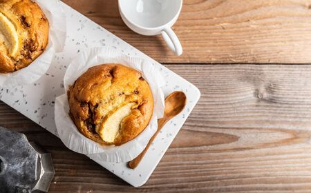 Fresh homemade apple muffins with cinnamon.の写真素材