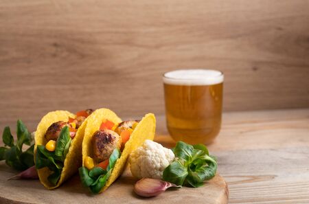 Homemade delicious taco with vegan meatballs and vegetables.の写真素材