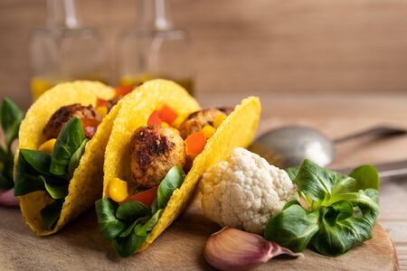 Homemade delicious taco with vegan meatballs and vegetables.の写真素材