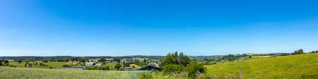 Rural landscape during summer time, agricultural fields on a beautiful day.の写真素材