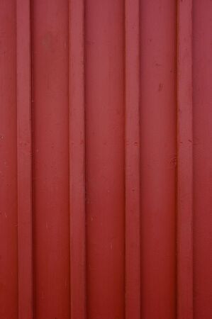 A classic red wooden wall.の写真素材