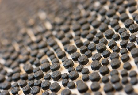 Black dots in a uneven pattern, looking strange.の写真素材