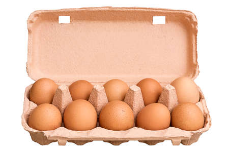 Ten brown eggs in a carton isolated on white