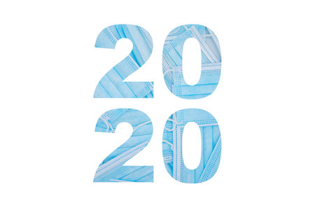 Isolated year 2020 graphic with surgery mask background and copy space.