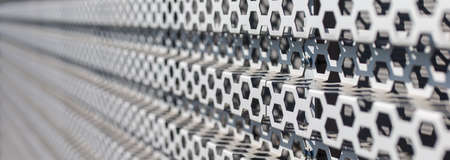 Structure made of metal parts with sharpening point in panorama format as background or banner