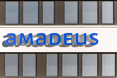Administration building with logo of the company amadeus with blue lettering in bad homburg, Germany taken on 13.02.2021. Horizontalのeditorial素材