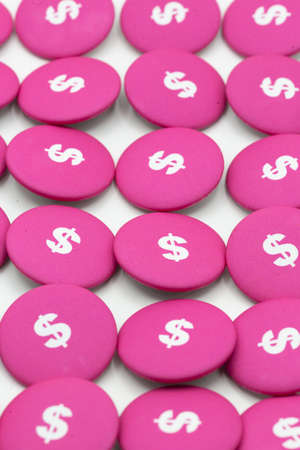 Pink buttons with dollar signs, lined up for background for all topics related to business, finance...