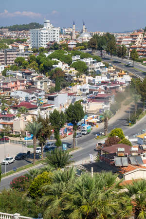 View of a Turkish town from a hotel in the resort of Kusadasi in the Aegean, Turkey in summer. Verticalのeditorial素材