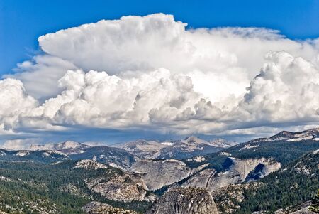 Thunderstorms form quickly during the summer in the high sierra, Yosemite National Park, California の写真素材