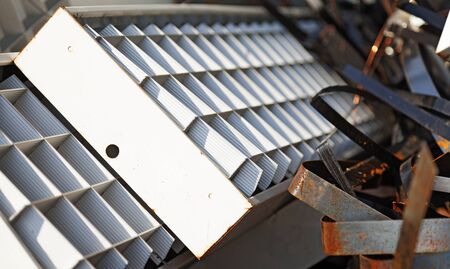 fluorescent lamps and metal debris thrown into the forest near Robertsfors