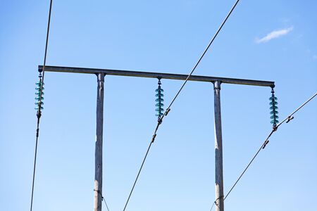 electric poles with wires and transformers