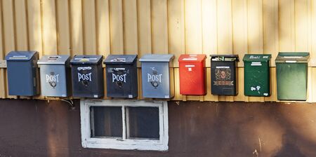 Umea, Sweden - September 15, 2019: several different mailboxes in a rowのeditorial素材