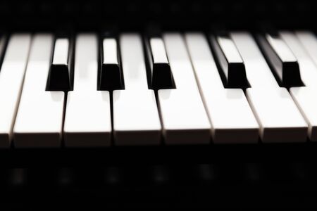 the keys of a piano seen from the sideの写真素材