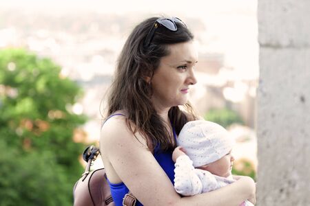 Budapest, Hungary - May 28, 2019: Mom and infant look out over the city