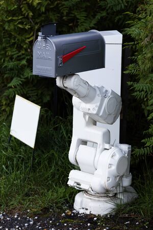 the future mailbox with robotic arm, something for the postman to fearの写真素材