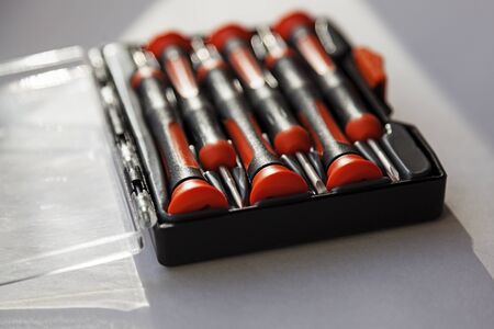 several screwdrivers in one set, plastic box with open lid includedの写真素材