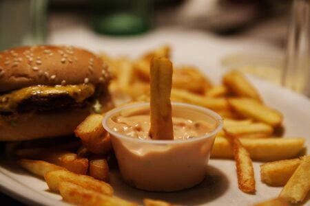 not so fresh junk food with lots of greasy dressingの写真素材