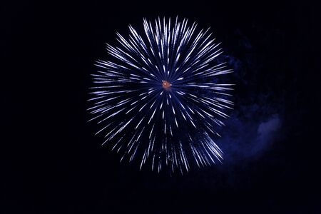 blue fireworks over the sky during New Year's Eveの写真素材