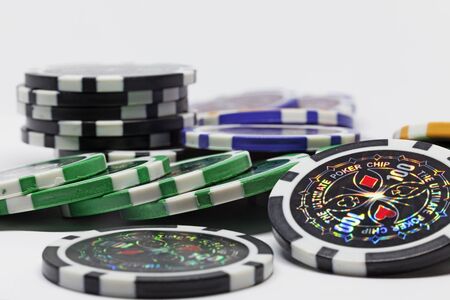 Umea, Norrland Sweden - February 7, 2020: lots of poker chips in a pile of different denominationsのeditorial素材
