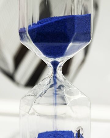 Umea, Norrland Sweden - March 11, 2020: hourglass with blue sand at the department store