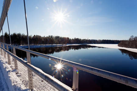 Umea, Norrland Sweden - March 8, 2020: winter landscape from new bridge with the river partly frozen to iceのeditorial素材