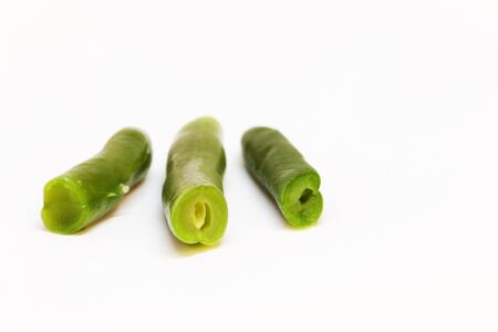 three Haricots verts on white backgroundの写真素材