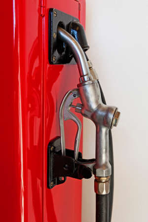part of an old red gasoline pumpのeditorial素材